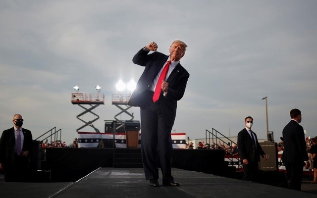 U.S. President Donald Trump reacts at the end of his campaign rally at Ocala International Airport in Ocala, Florida, U.S., October 16, 2020. REUTERS/Carlos Barria TPX IMAGES OF THE DAY